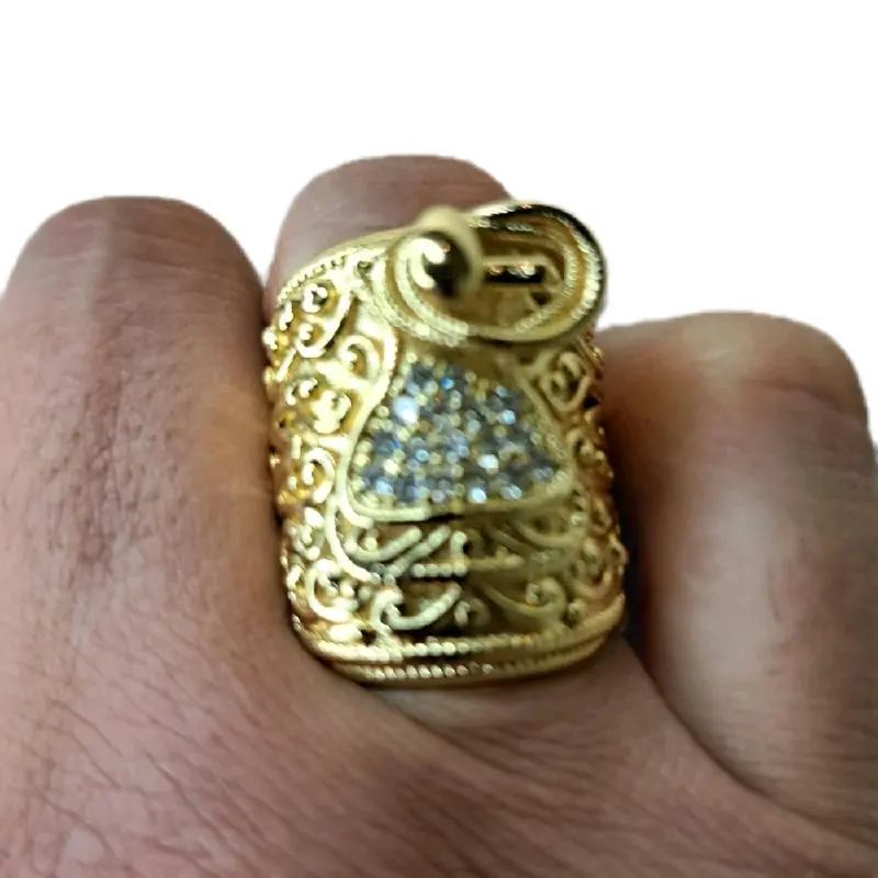 large saddle ring adjustable for size. gold plated stainless Steel. 0