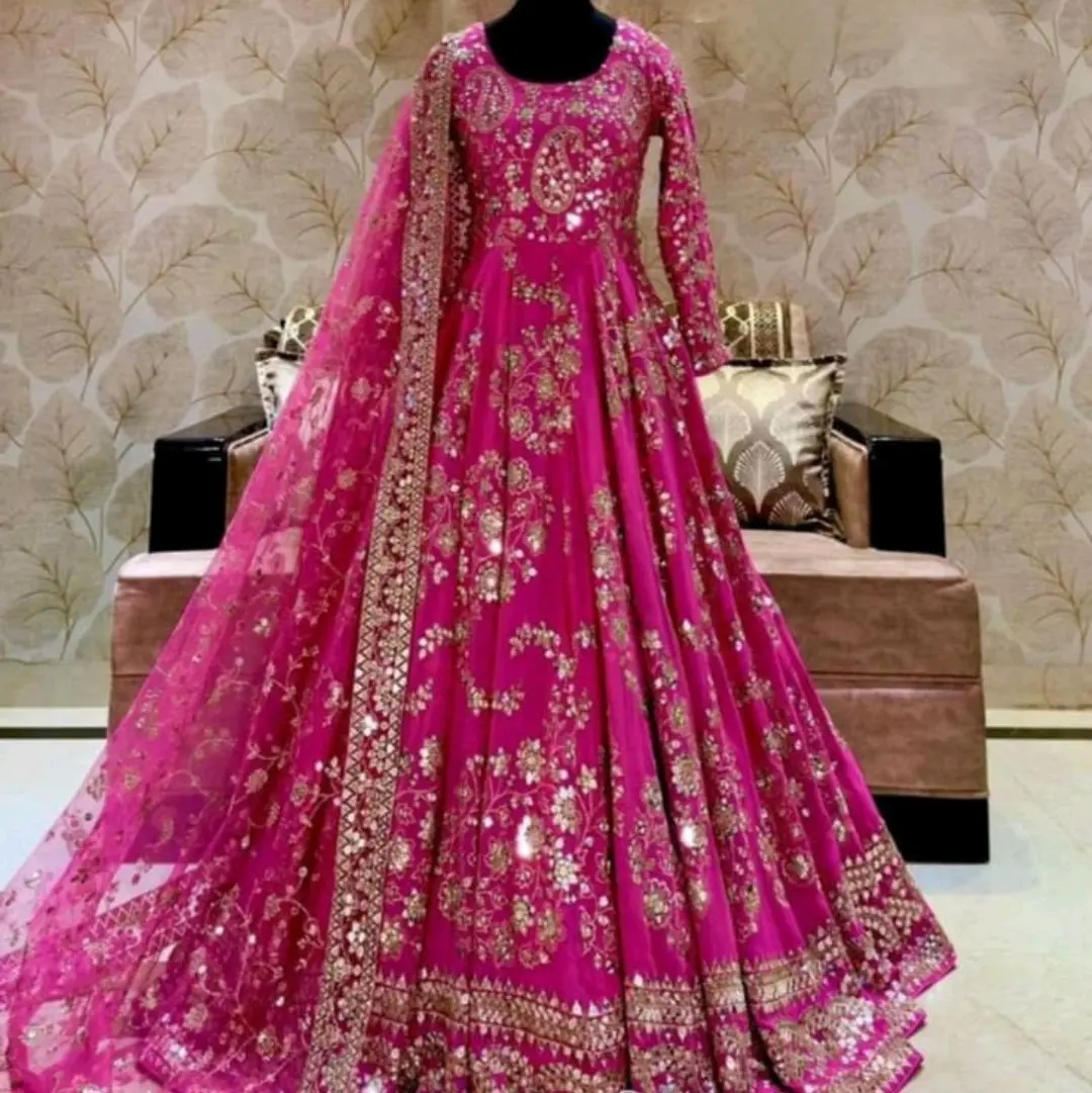 Beautiful hot pink, very heavy embroidery    size 42 and full lenght