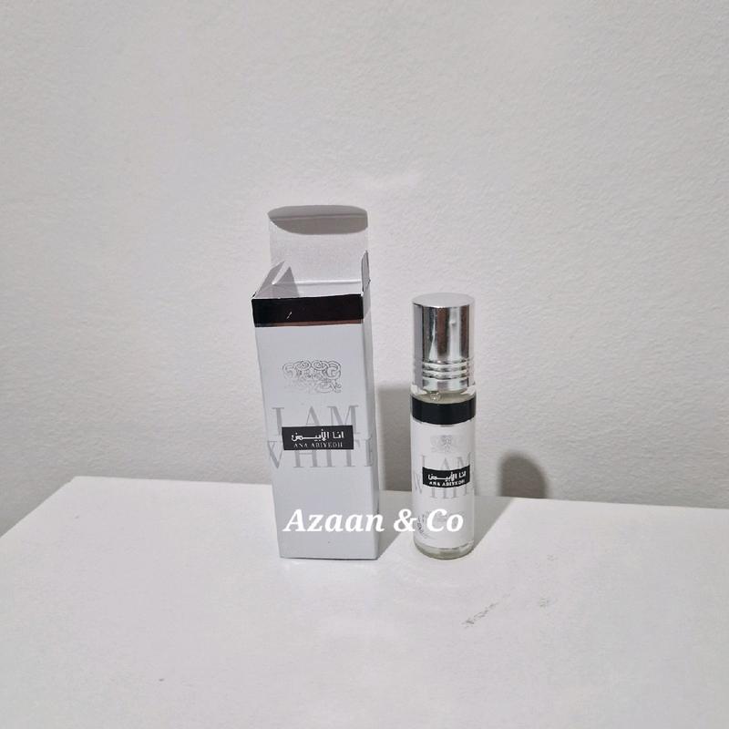 Ana Abiyedh Leather (I am White) Perfume Rouge Poudree Collection | Option to buy Individually or as a Set | 60ml EDP by Lattafa, 10ml Roll on Perfume Oil | Arabian Scents Fragrance Perfume Dubai Perfumes Eau De Parfum 4