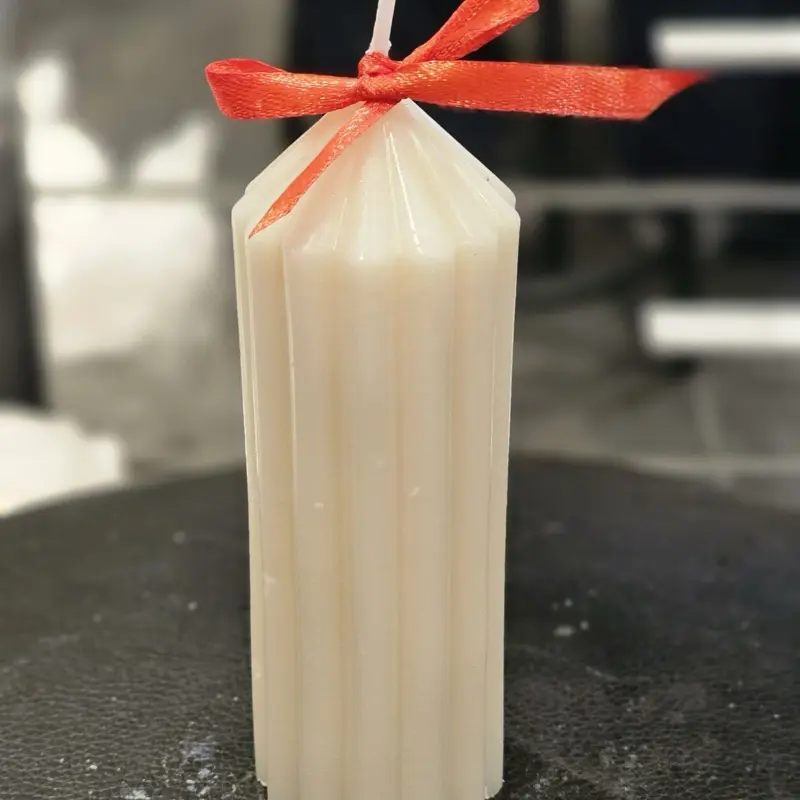 Small skinny pillar candle