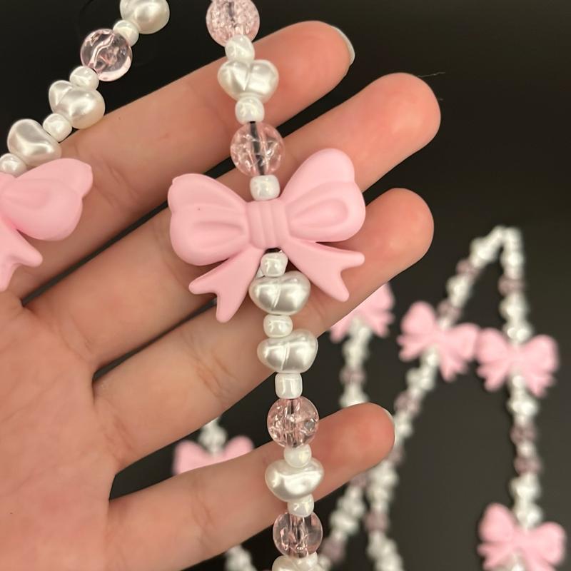 Pink crystal + bow phone charm 4