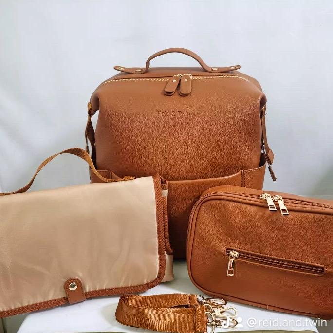 Premium Vegan Leather Changing Backpack with Reid & Twin mat and wipe pouch, Gold YKK Zips, Large Capacity Diaper Bag for Baby with Insulated Pockets and Pram Clips 2