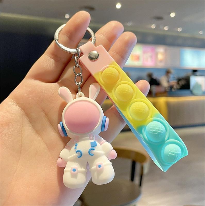Unlock the Fun of Space with Our CuteAstronaut Keychains -Free Gifts with YourPurchases 6