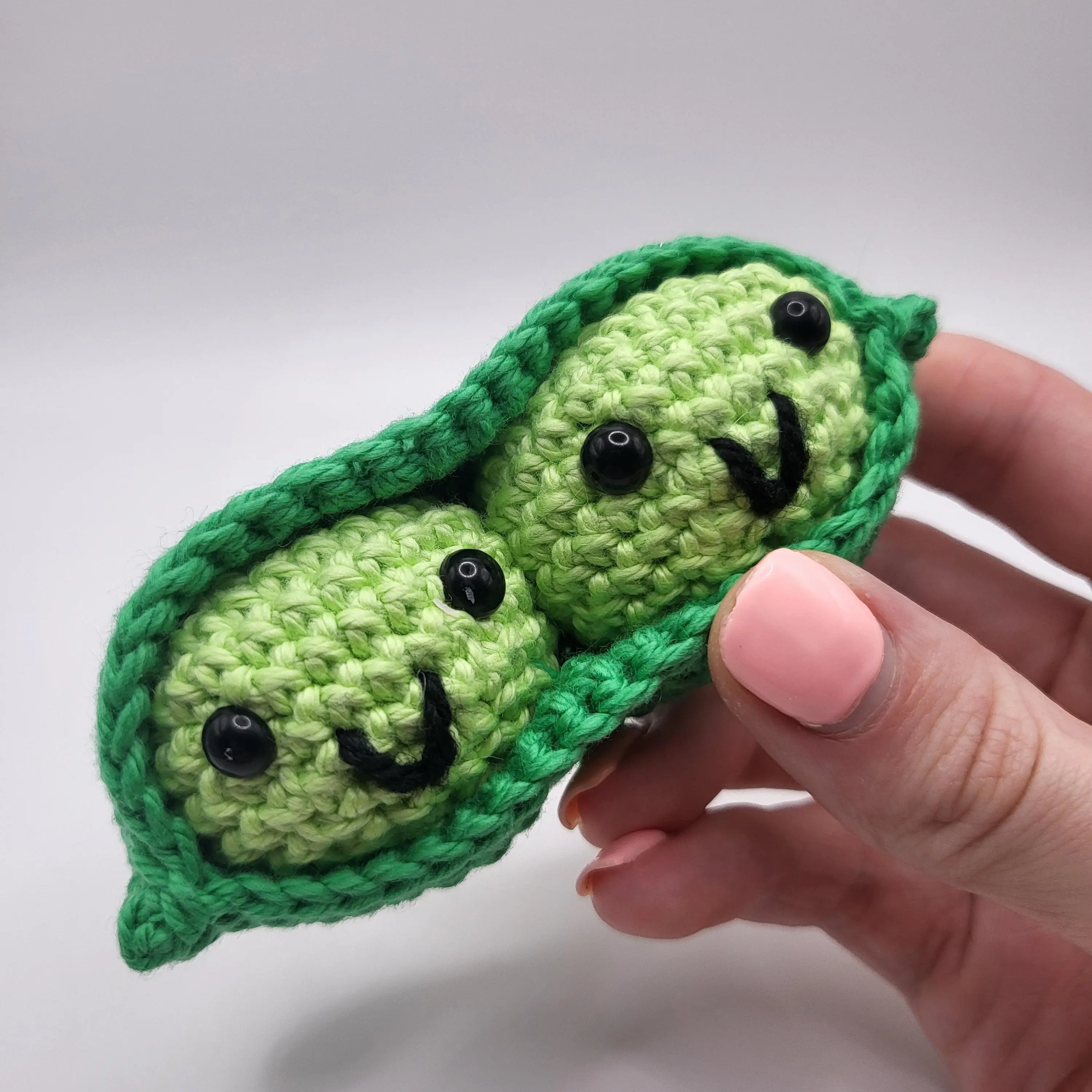 Crochet Positive Peas. 2 peas in a pod made from 100% cotton yarn with safety eyes.