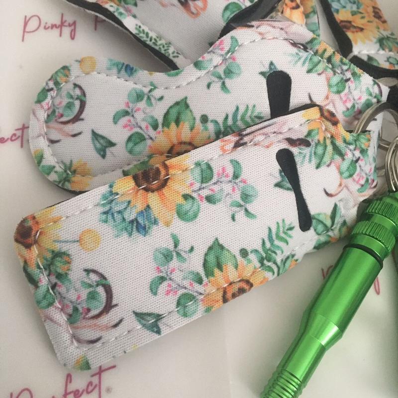 Pinky Perfect UK Legal Green Sunflower Key Chain Set with 3-in-1 Stylus, Door Opener, Bottle Opener, Whistle, Personal Alarm, Light, Wristlet, Sanitiser Pouch, Bottle, Lip Balm Holder, Pom Pom and Car Escape Tool 2