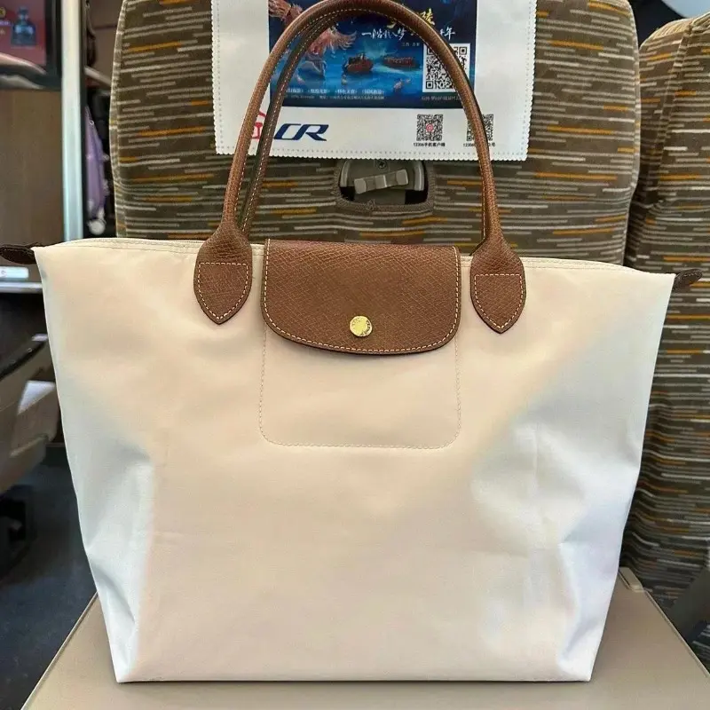 Product Introduction of Women Folding Designer Fashion Casual Shoulder Bag High Quality Nylon Handbags Sac Large Capacity Classic Tote Bag New 9