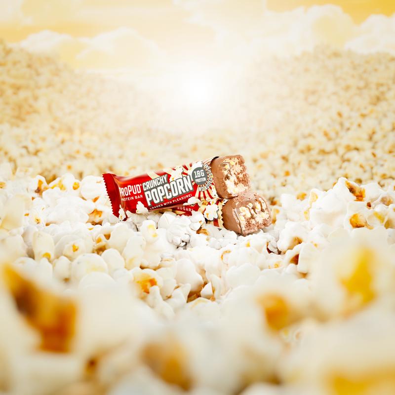 ProPud Crunchy Popcorn High Protein Bar 18g Protein (12x55g), Topped With Crispy, Roasted Corn And Covered With Milk Chocolate, No Added Sugar, Perfect Pre and Post Workout Nutrition 6