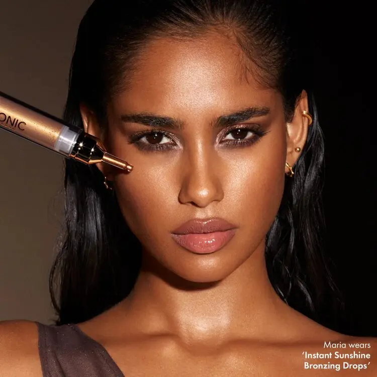 ICONIC LONDON Instant Sunshine Bronzing Drops for a Flawless Look - Makeup, Bronzer. Super-concentrated bronzing elixir that adds warmth and radiance to the skin. Blend Golden Nourishing Cosmetic 1