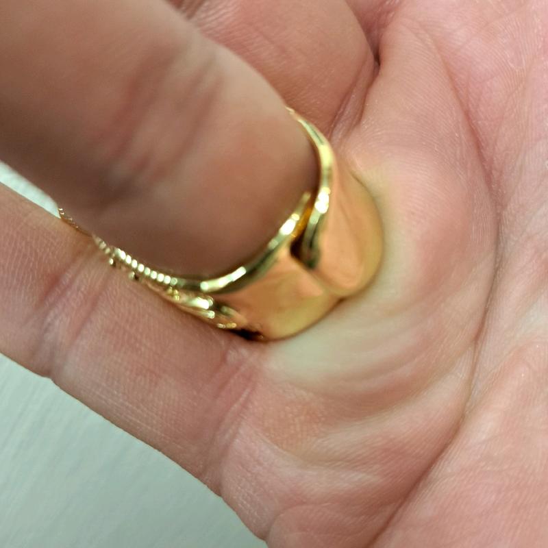 large saddle ring adjustable for size. gold plated stainless Steel. 6