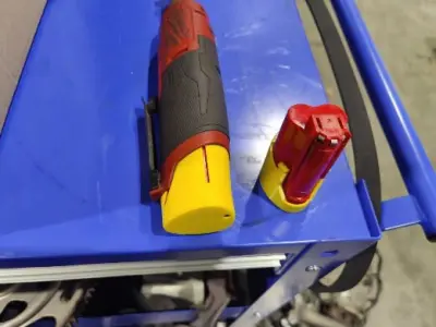 cover replacement/ spare for the smaller Milwaukee m12 battery. 4