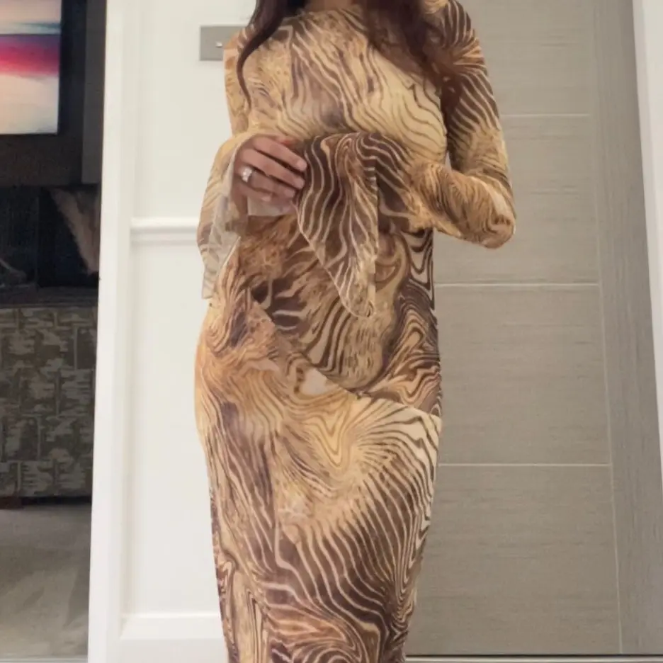 SHESOUT in the printed flared sleeve split detail mesh maxi dress