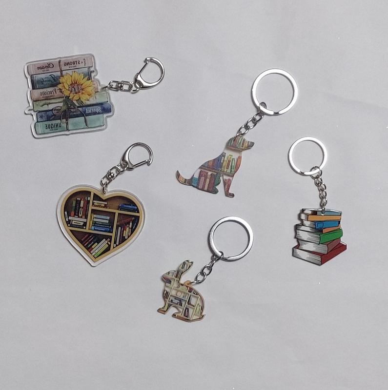 Mystery Box with 5 Items: Book, Bookmark, Keychain, Pens, and Socks 3