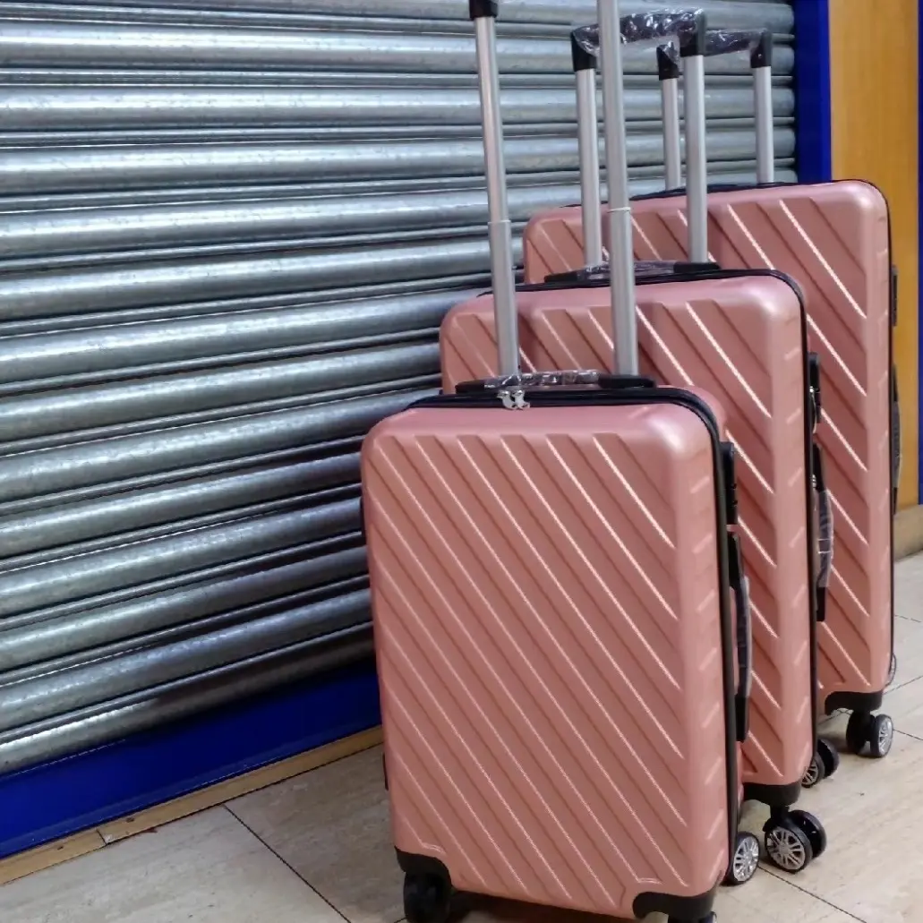Suitcases Set of 3 (20x24x28) inches Rose gold hard case waterproof