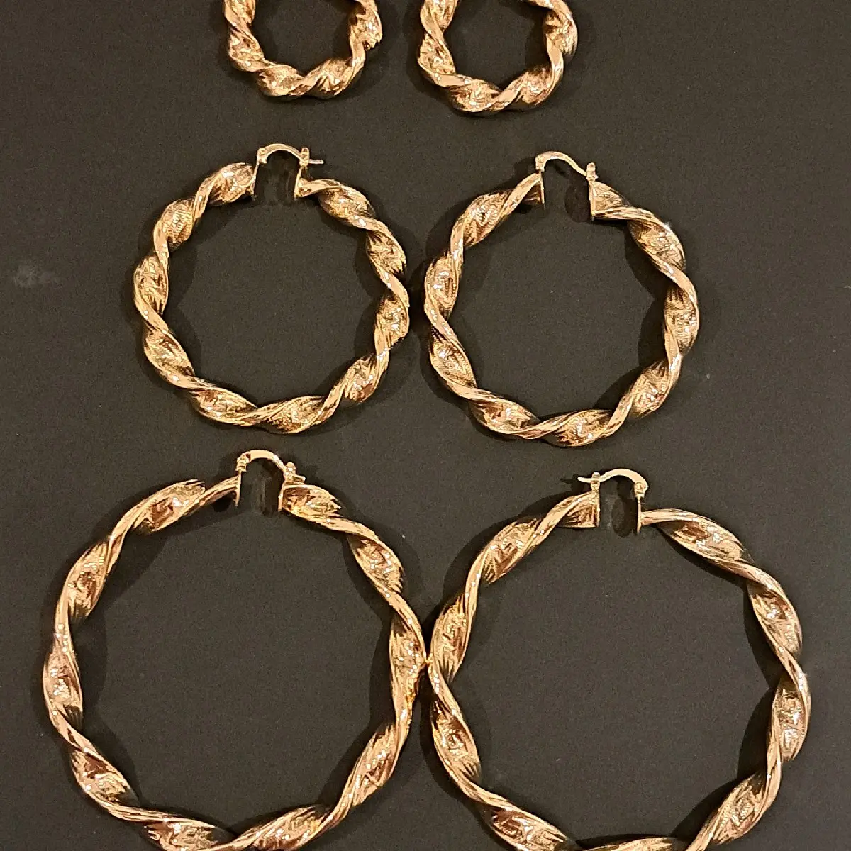 big twisted hoop earings. gold plated stainless Steel. different sizes available