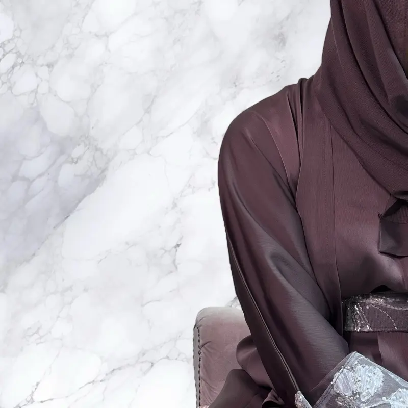 Naya 4 Piece Abaya Set - offers a luxurious experience with its premium quality satin construction. This elegant set includes inner garment, cardigan, a stylish belt, and a matching hijab. women ramadan 2