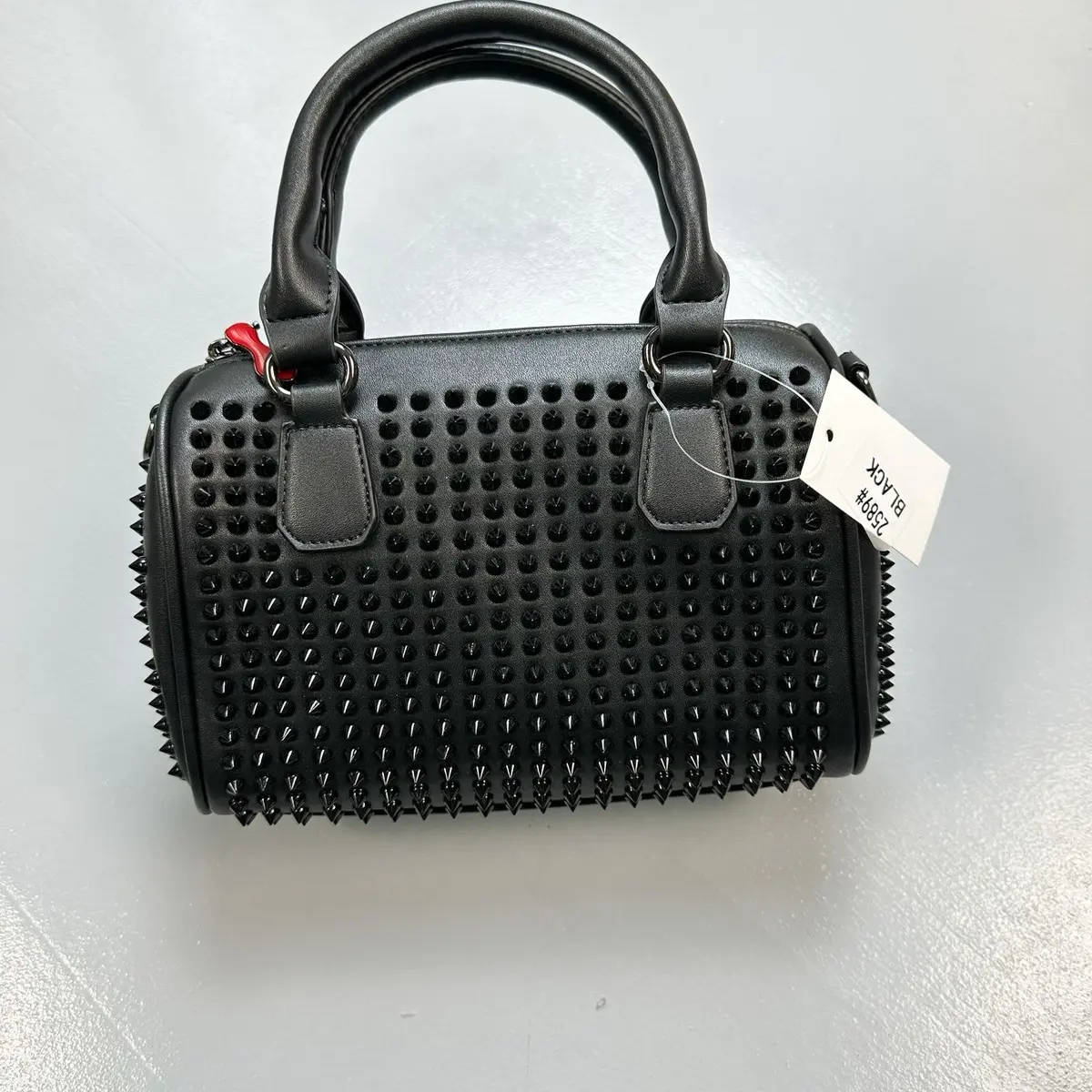 Spiky ladies bag 11” long 6” tall