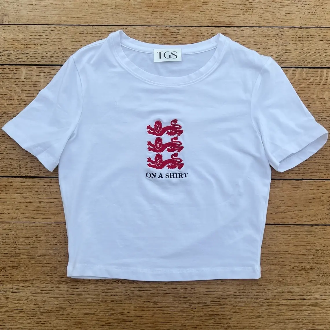 3 Lions On A Shirt Baby Tee