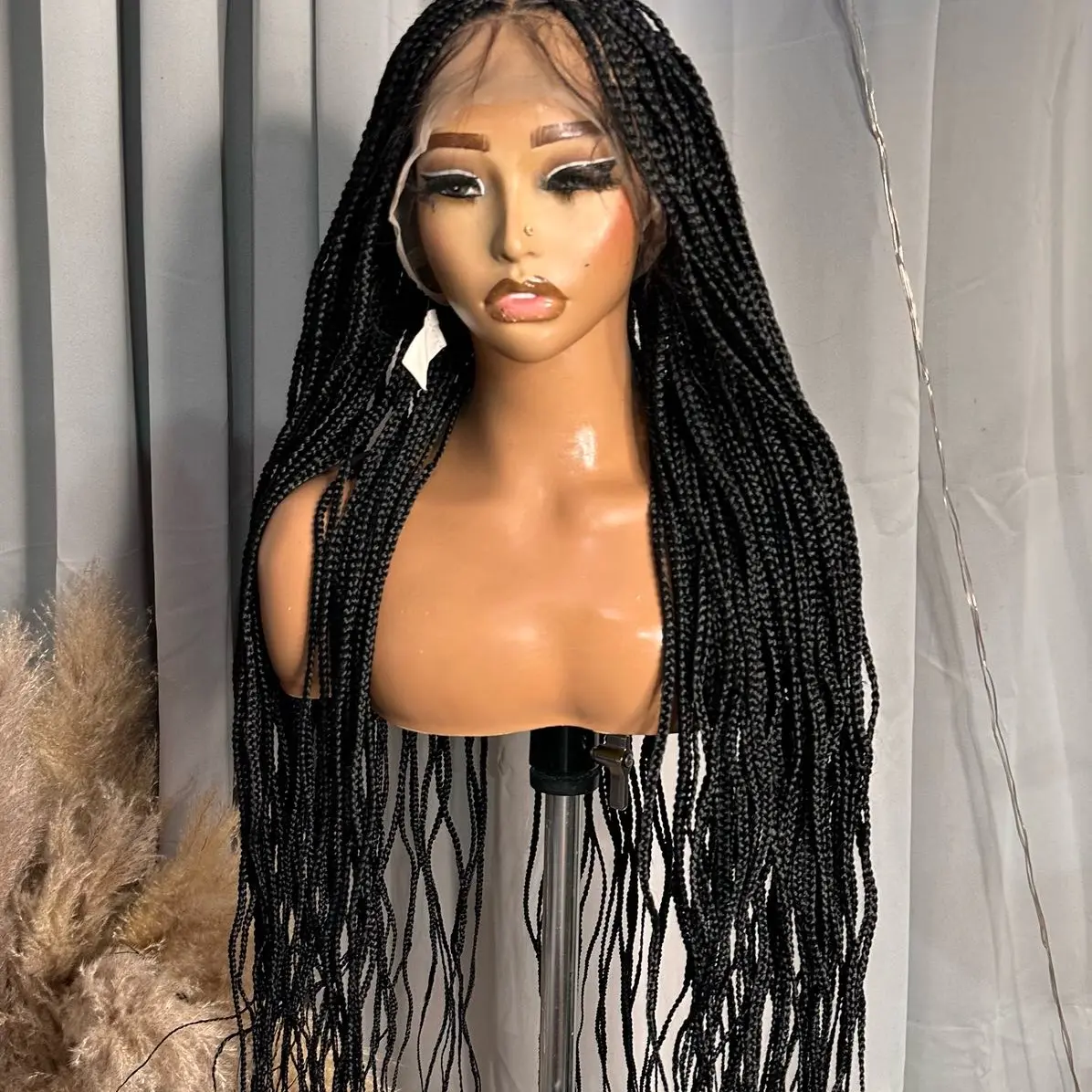 40 inches full lace wig knotless braided wig in colour 2. Ideal for a seamless wear for lovers of braided hair.