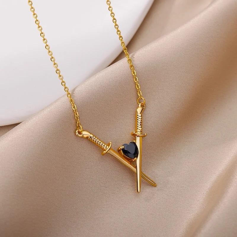Sword With Black Crystal Heart Necklace In Gold Or Silver Finish, Crossed Over Sword With Heart Design Necklace, Gift Necklace For Her 3