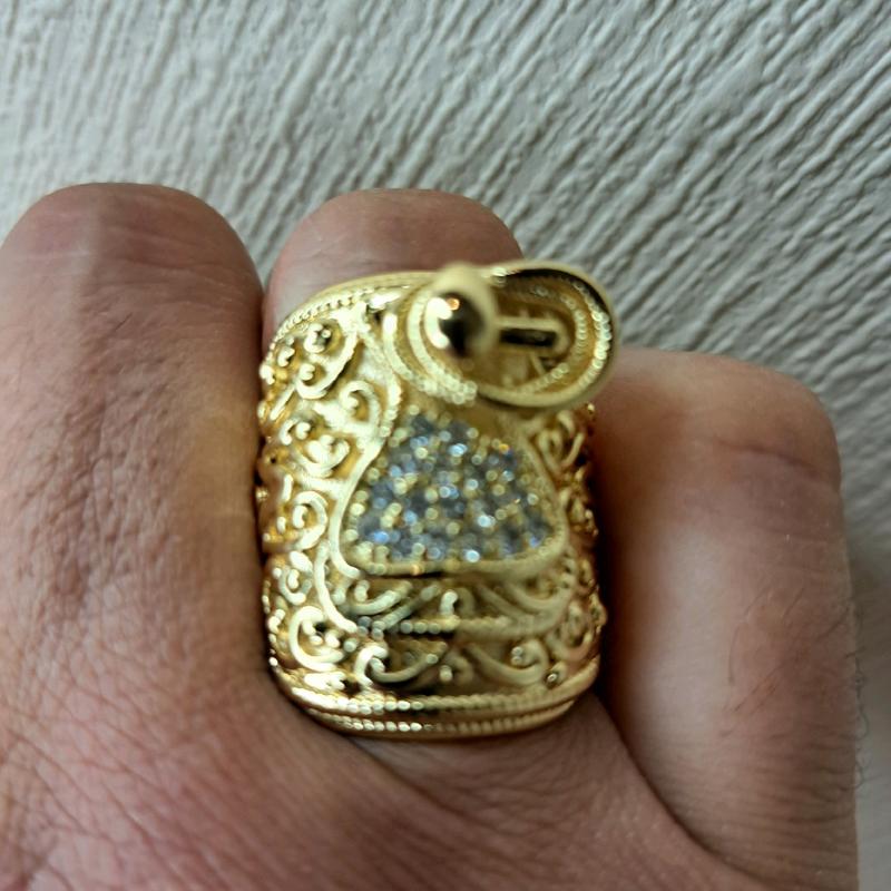 large saddle ring adjustable for size. gold plated stainless Steel. 3