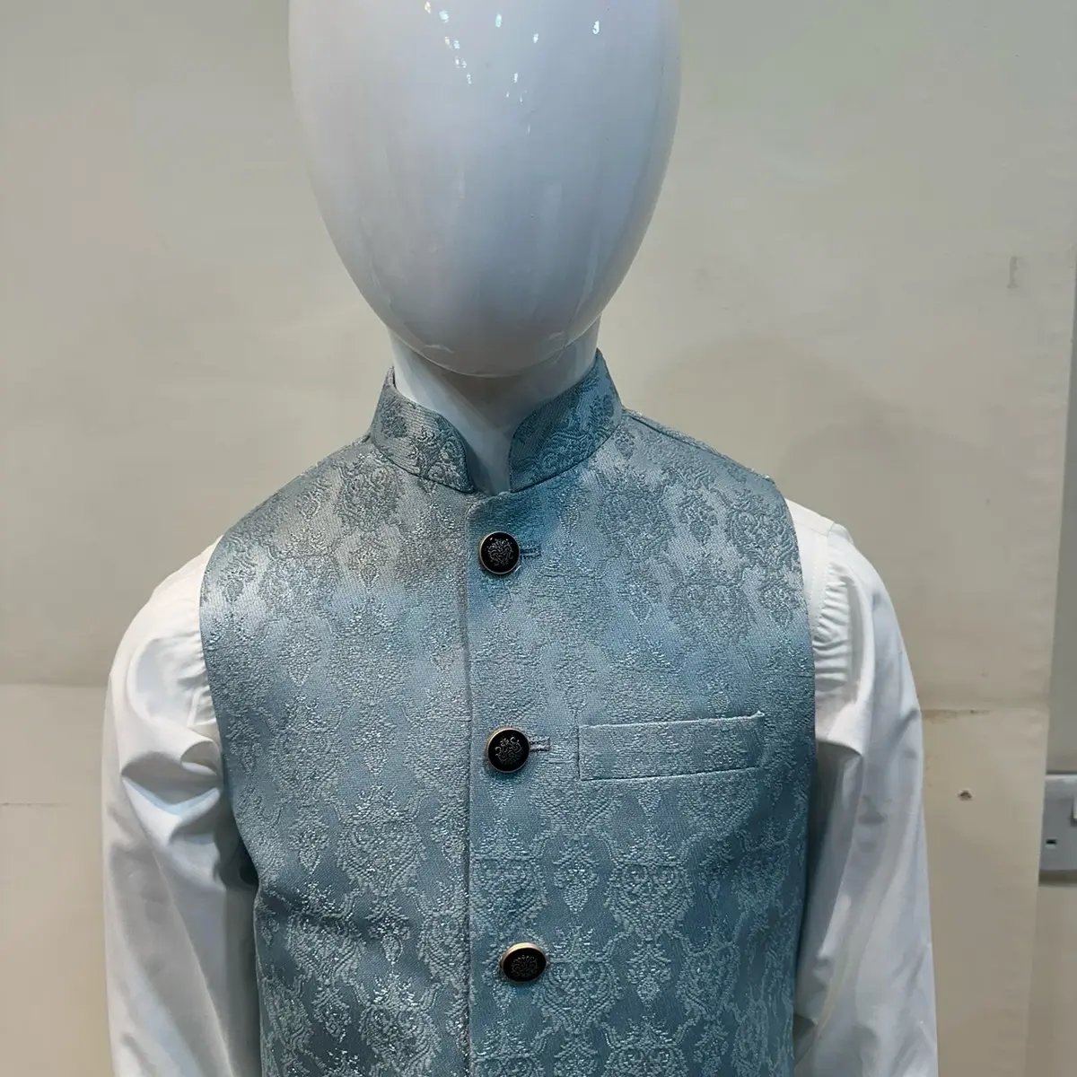 Menaal’s Kids Self Textured Waist coat .