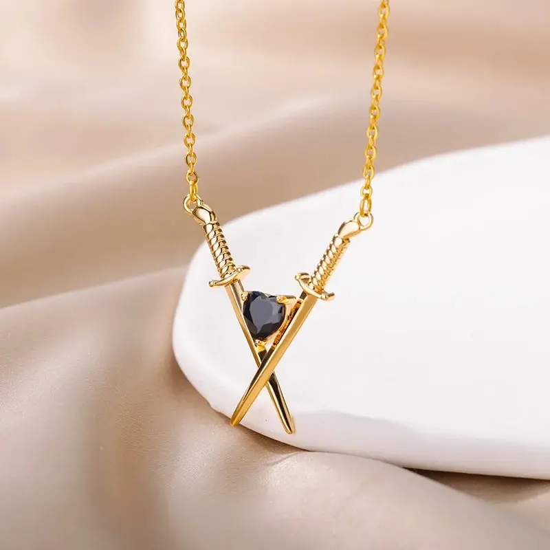 Sword With Black Crystal Heart Necklace In Gold Or Silver Finish, Crossed Over Sword With Heart Design Necklace, Gift Necklace For Her 2