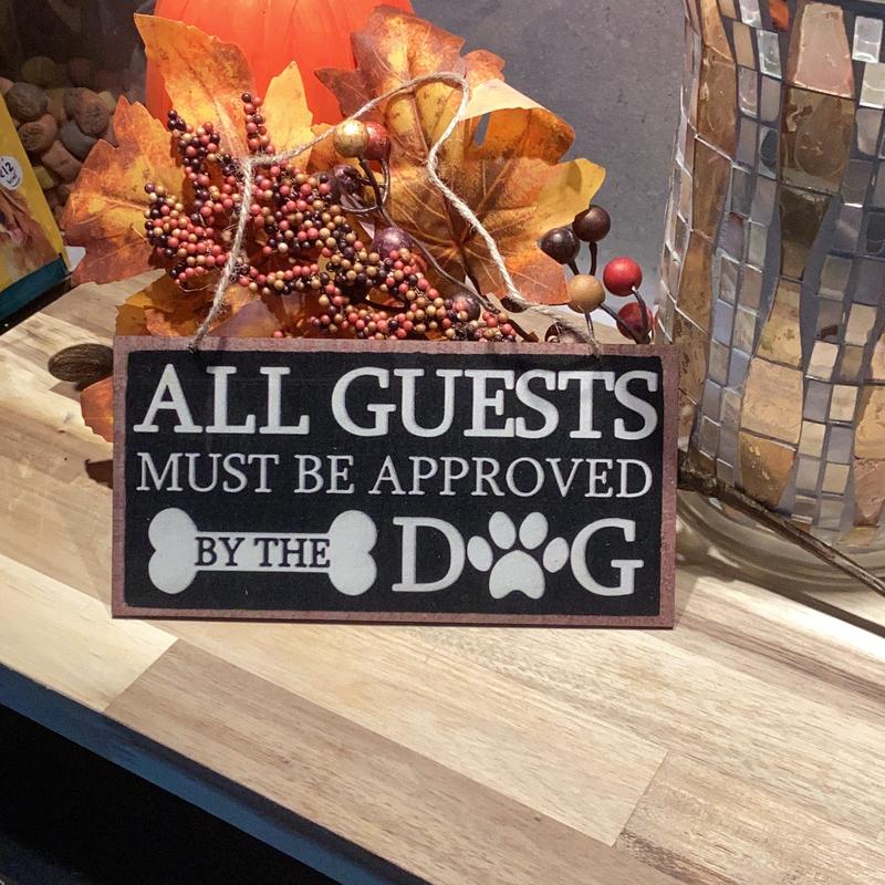 All guests must be approved by the dog sign 1