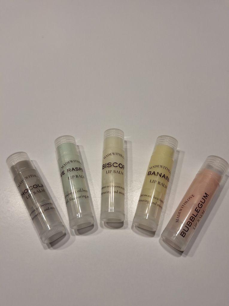 Product Introduction of Moisturizing Lip Treatment - Soft and Smooth Lips - Blue Raspberry, Bubblegum, Banana, Chocolate, and Biscoff Flavors Available 9