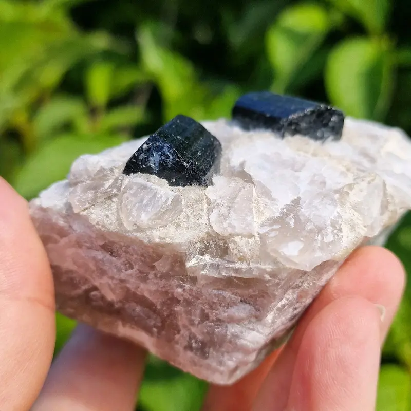 Raw black tourmaline in a chunk of raw quartz 5
