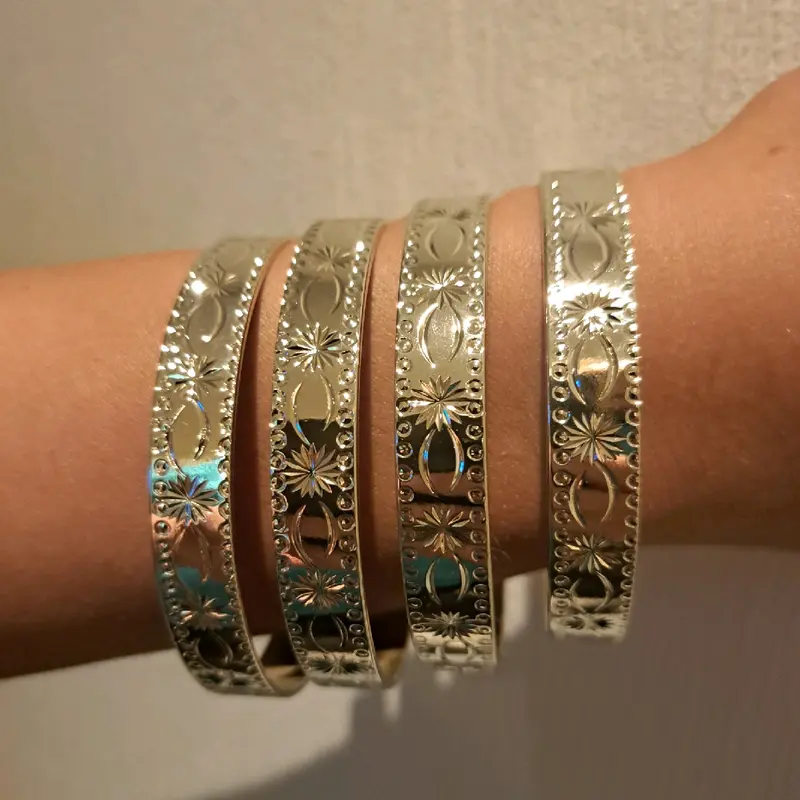 star burst stacking bangles medium width set of 4 gold or silver plated available stainless Steel. 1