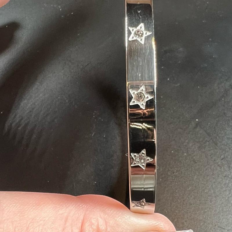 Kia star bracelet available in silver and gold. Diamanté star detail 6