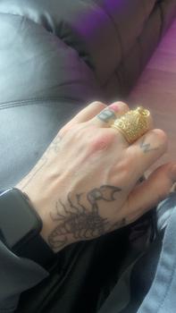 Product Review of large saddle ring adjustable for size. gold plated stainless Steel. from M**t 0