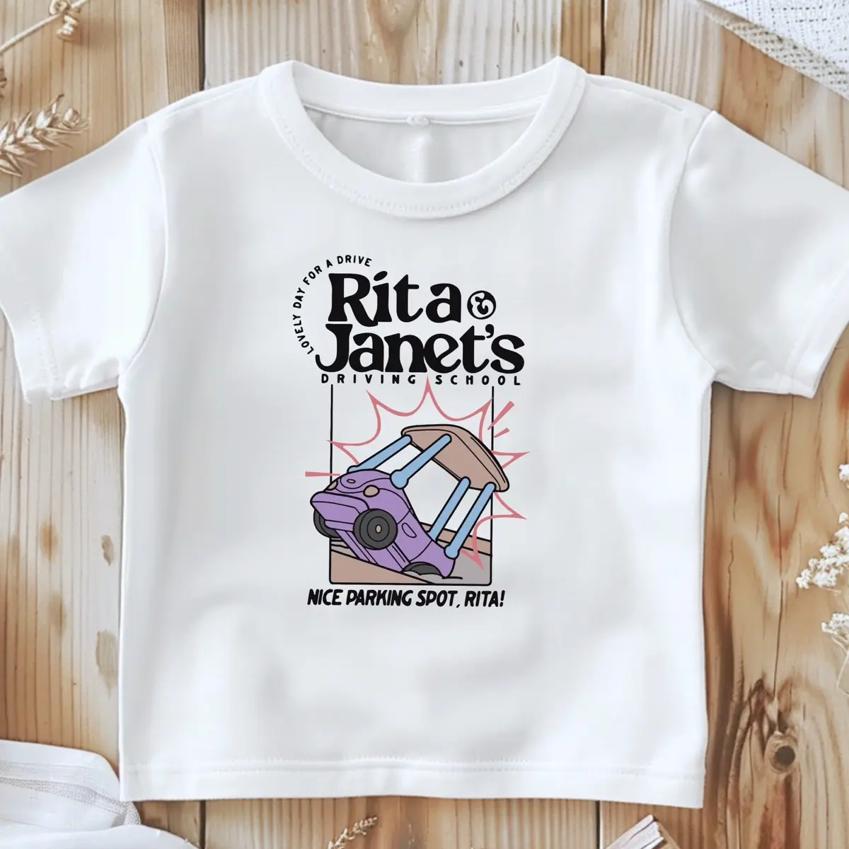 Rita and Janet’s driving school Bluey inspired unisex design nice parking spot Rita toddler  graphic baby tees