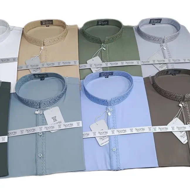 Men’s trouser kameez with same colour embroidery on neck and buttons area ,colours and two pockets on the sides of kameez . Casual  Menswear  Traditional Clothes.embroidery ,