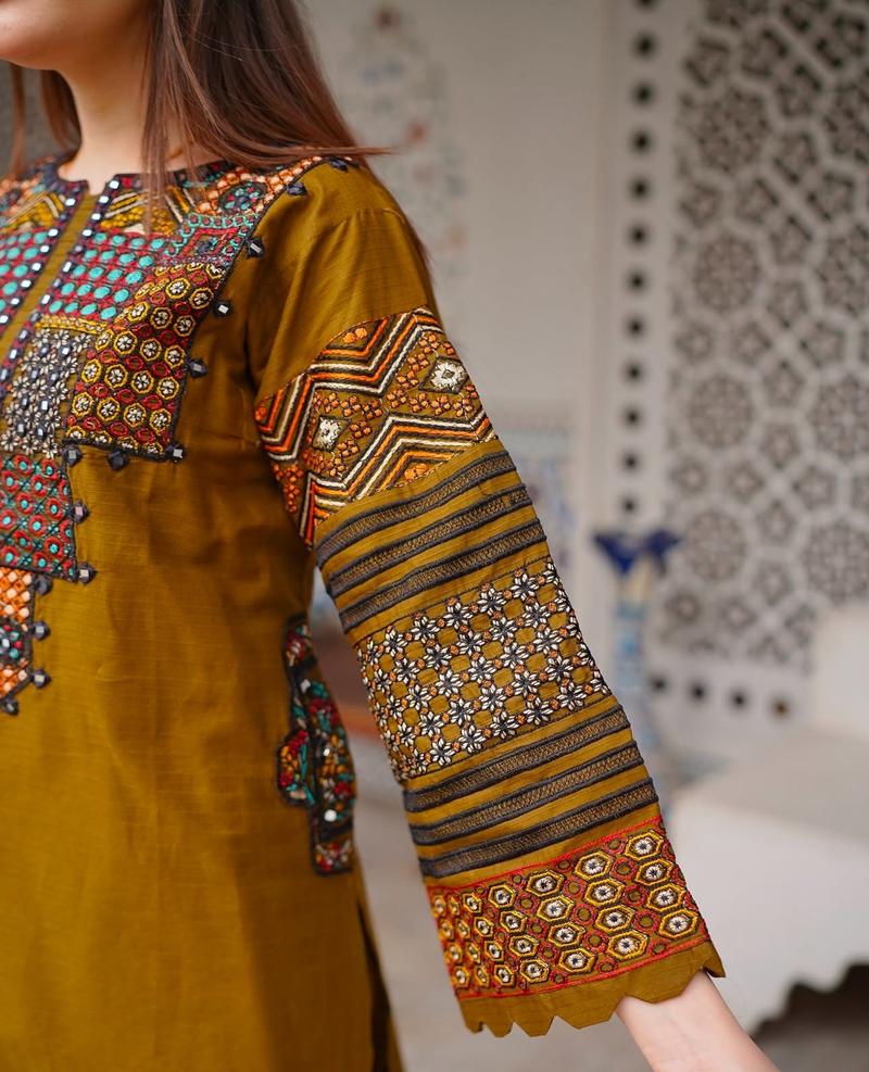 Product Introduction of 3-Piece Embroidered Khaddi Cotton Suit with Sindhi-Inspired Design. Comfort Matching 8