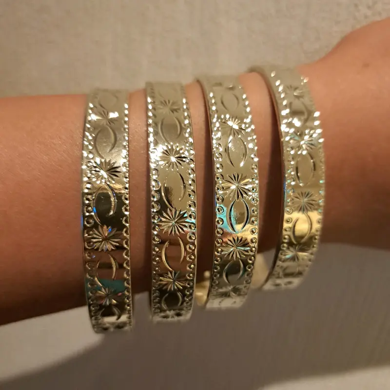 star burst stacking bangles medium width set of 4 gold or silver plated available stainless Steel. 4
