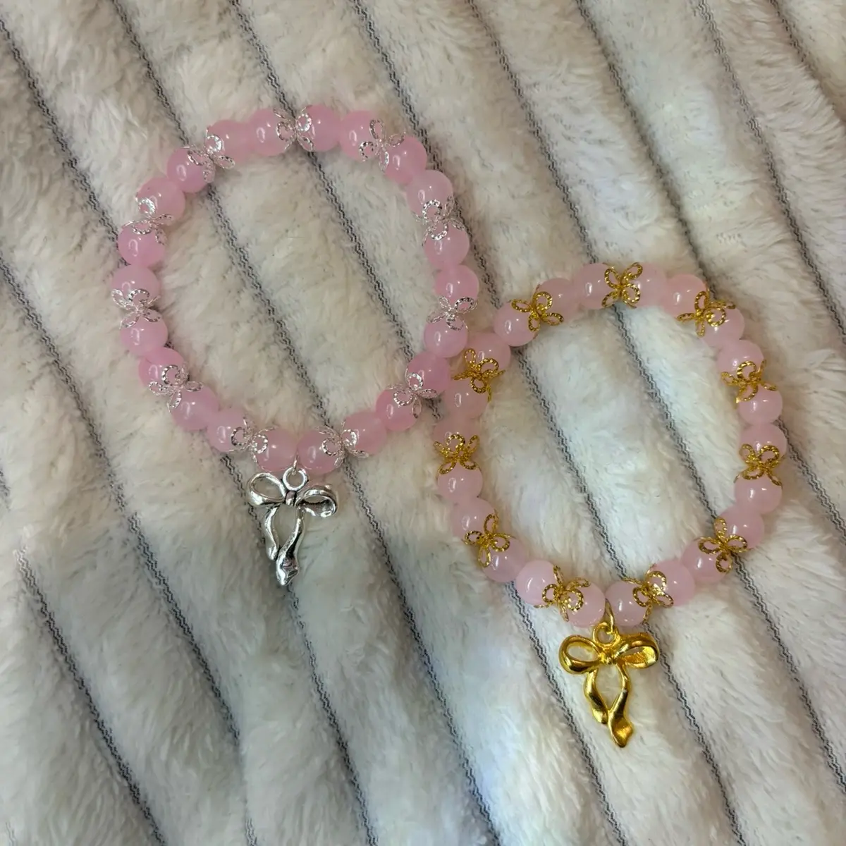 Pink beaded bow bracelet