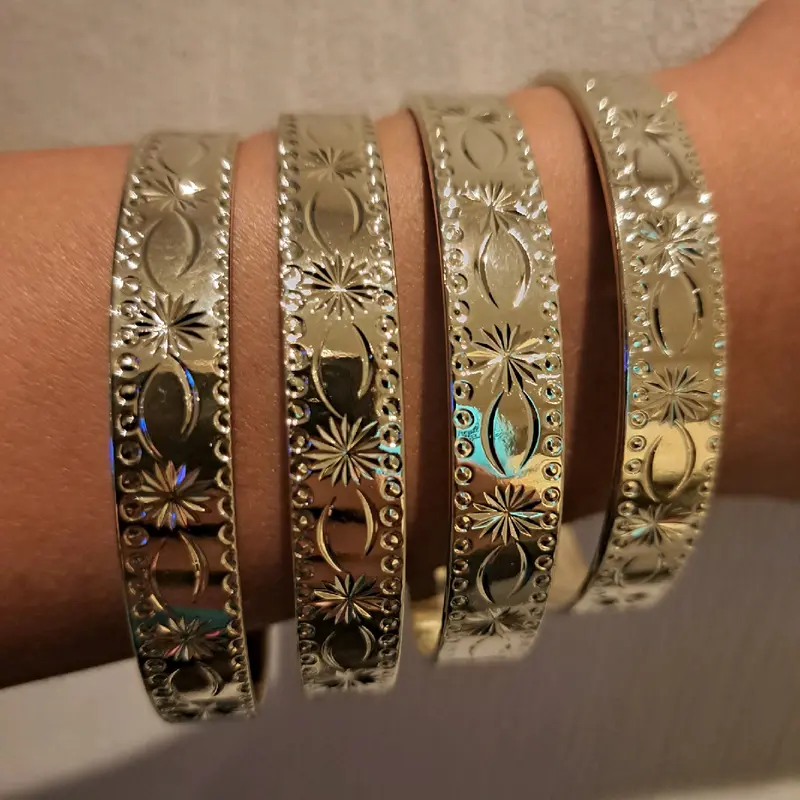star burst stacking bangles medium width set of 4 gold or silver plated available stainless Steel. 3