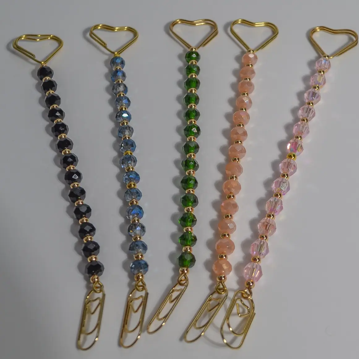 Bracelet Helper Tool, Bracelet Helper Fastening And Hooking Equipment in Pink, Peach, Green, Blue, Black, with Gold Spacer Beads