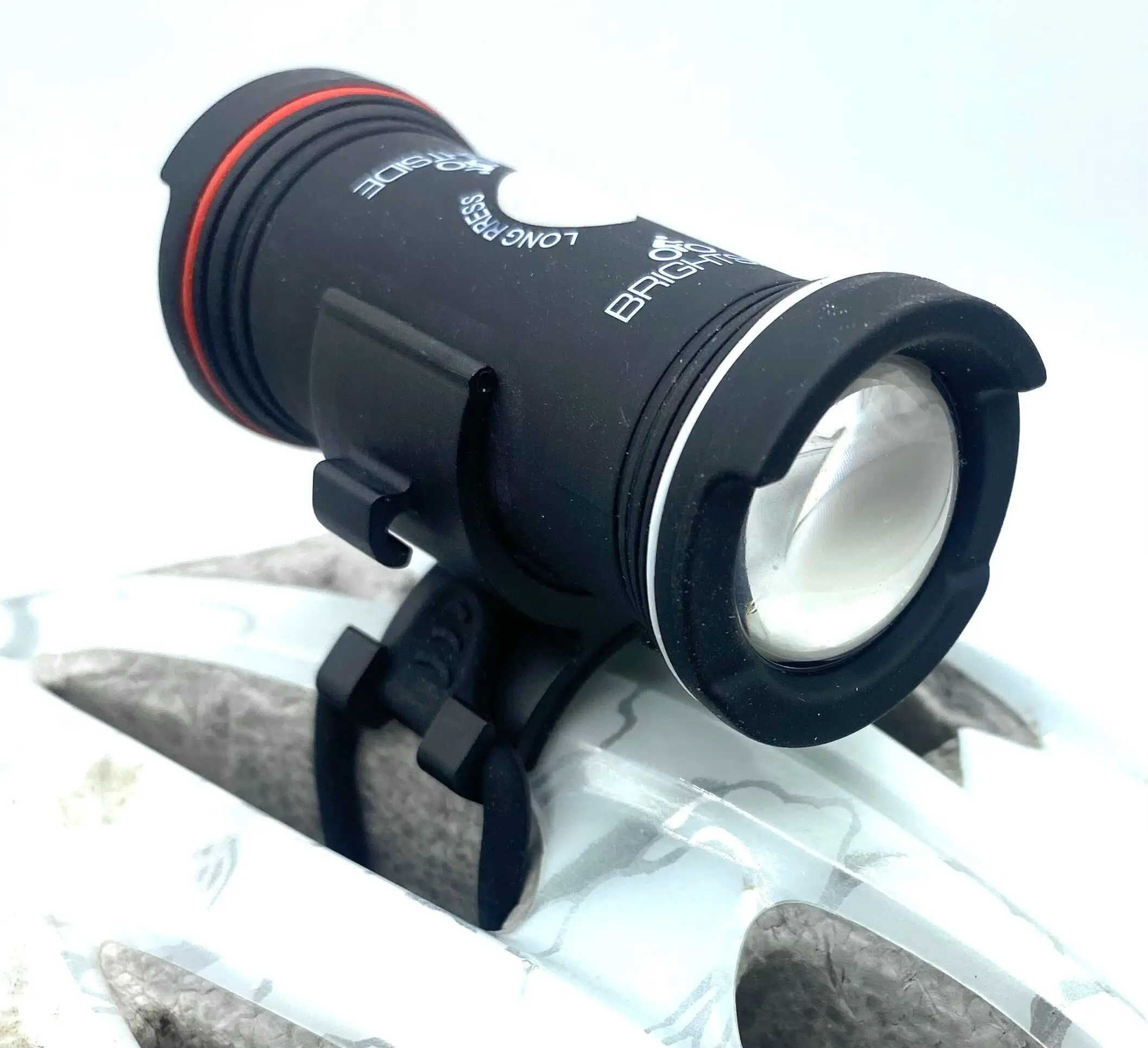 Brightside Bike Helmet Light. Best Selling 3 in 1 Front & Rear Bike Light. 43 hour Runtime. Fits most Helmets. Simple, secure and safe fitting.