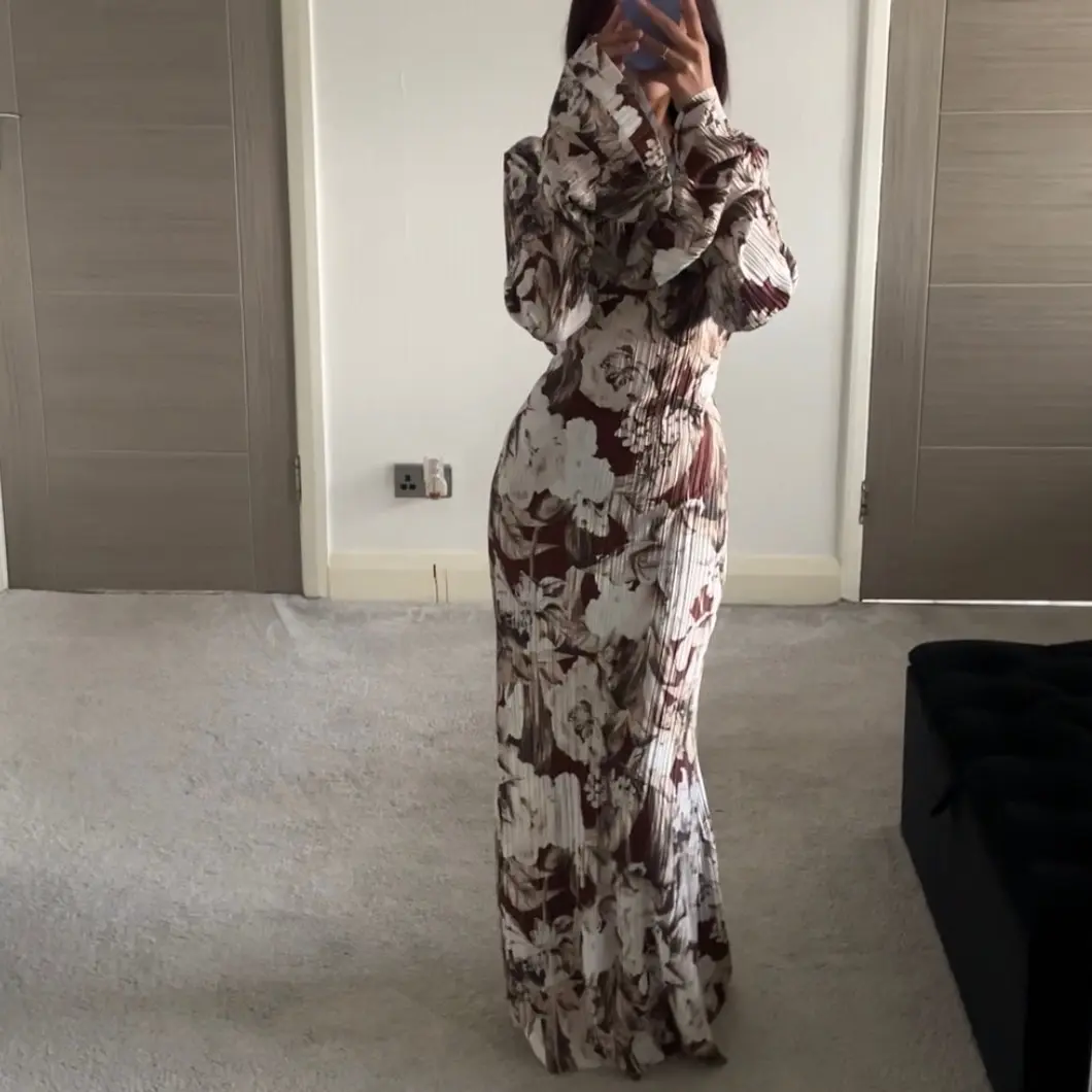 SHESOUT in the printed plisse double frill sleeve tie back maxi dress