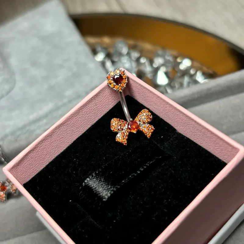 Red and Silver Bow Belly Bar for Women - Fashion Accessory