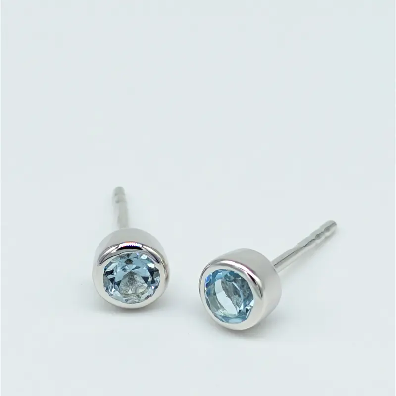 Set of 4 pairs - Round Blue Topaz Sterling Silver Stud Earrings 1