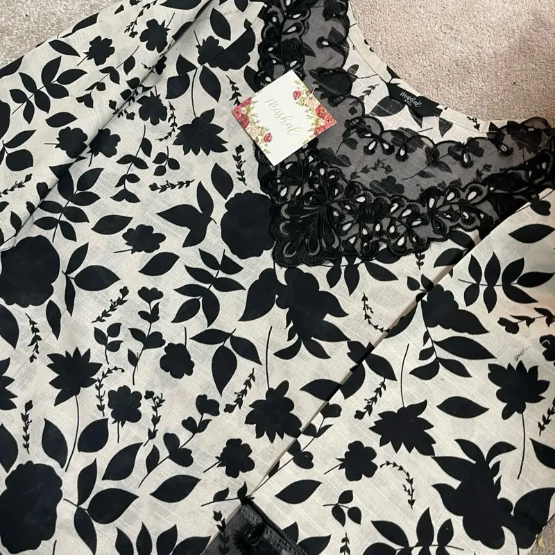 Monochrome Elegance: Floral Charm with Lace Highlights