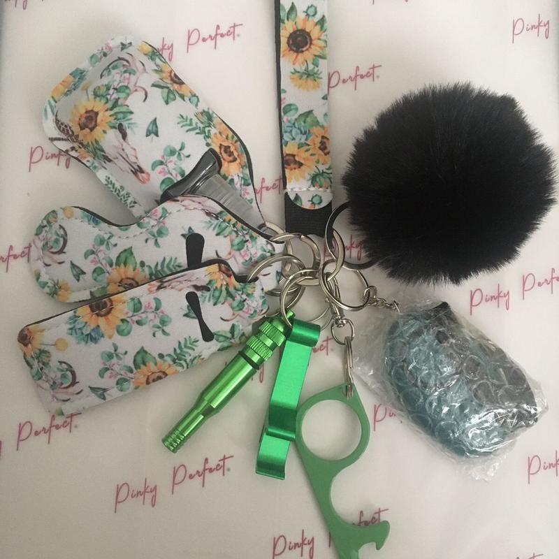 Pinky Perfect UK Legal Green Sunflower Key Chain Set with 3-in-1 Stylus, Door Opener, Bottle Opener, Whistle, Personal Alarm, Light, Wristlet, Sanitiser Pouch, Bottle, Lip Balm Holder, Pom Pom and Car Escape Tool 0
