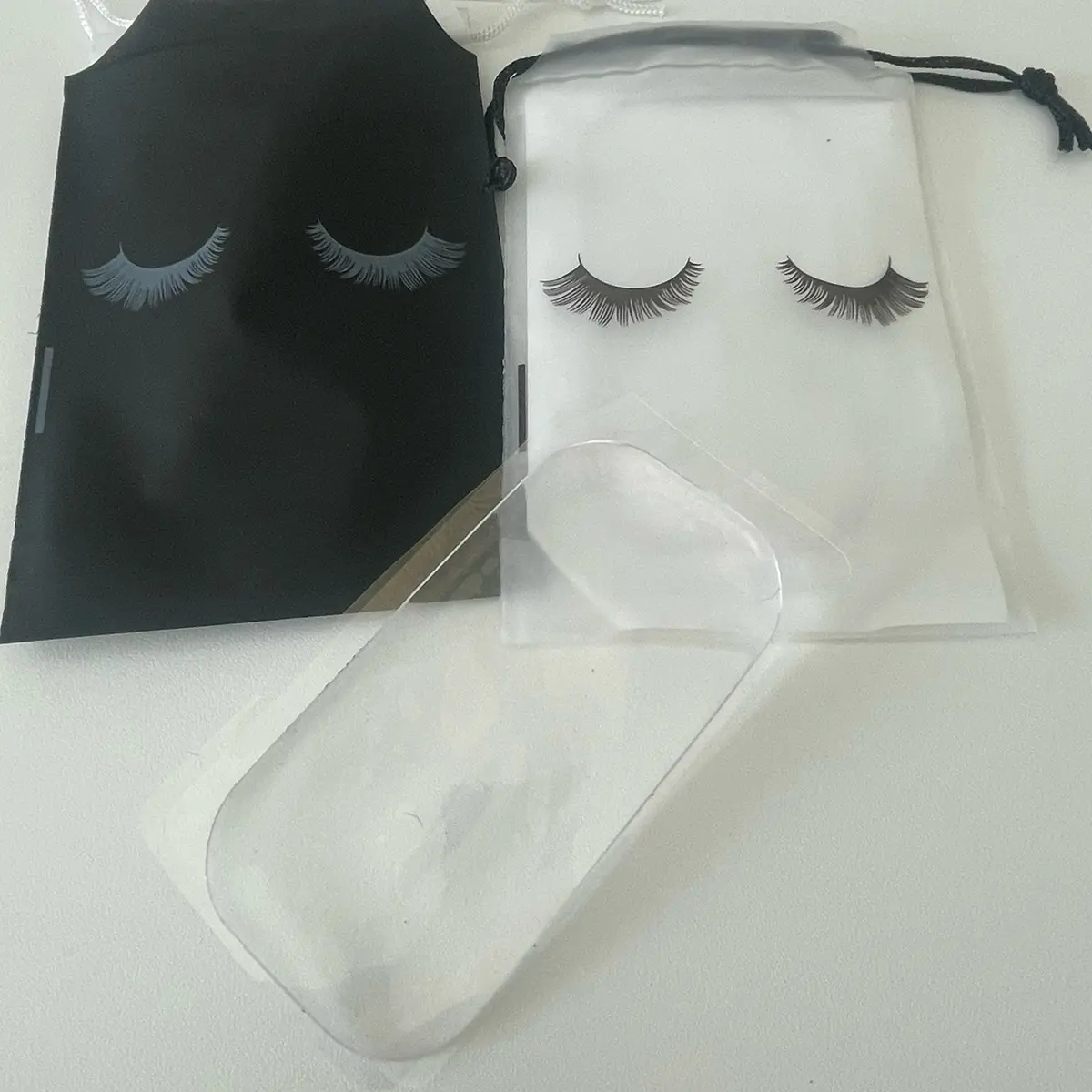 Lash shack pad for placement of pre glued clusters for lash mapping