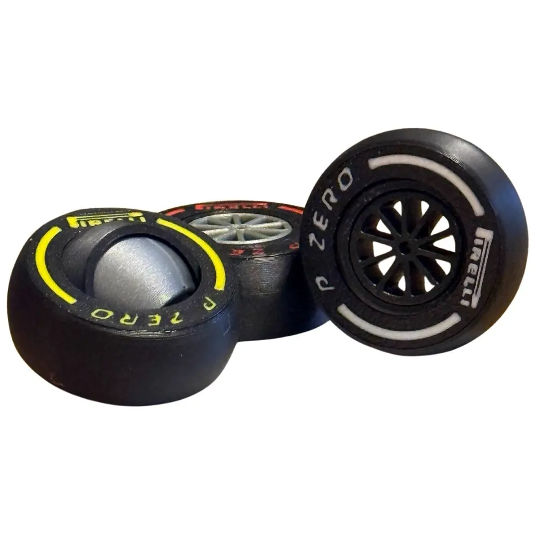 F1 Tyre Fidget Toy Gyro - Red/White/Yellow - Stress Relief. spinner