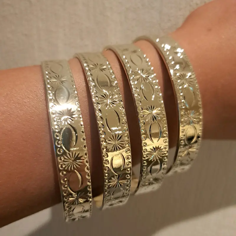star burst stacking bangles medium width set of 4 gold or silver plated available stainless Steel. 6