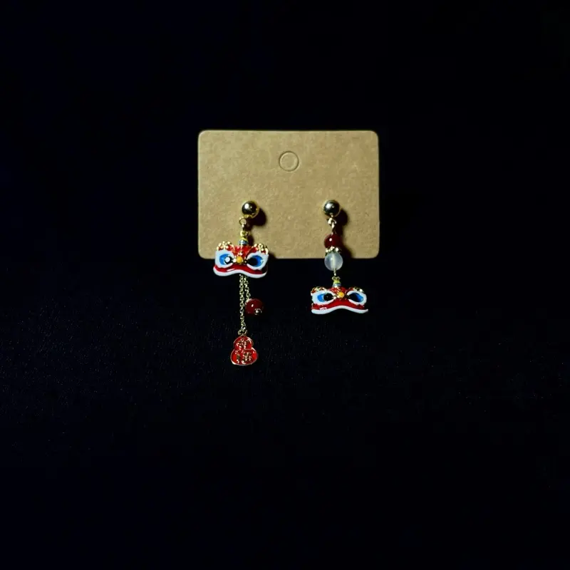 Folréa’s Lion’s Blessing Asymmetrical Earrings with Lion Mask Charms