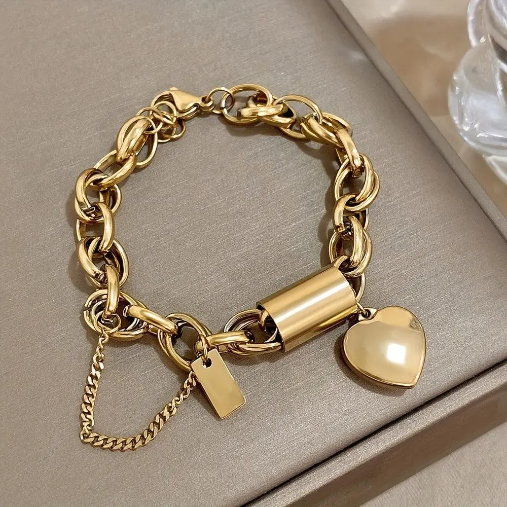 Elegant Golden-Tone Stainless Steel Chunky Chain Bracelet with Heart Charm - Fashionable Thick Link Design & Lobster Claw Clasp - Perfect Accessory for Women